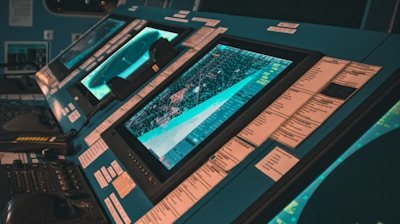 Logistics experts analyzing global supply routes on a digital map in a modern office.